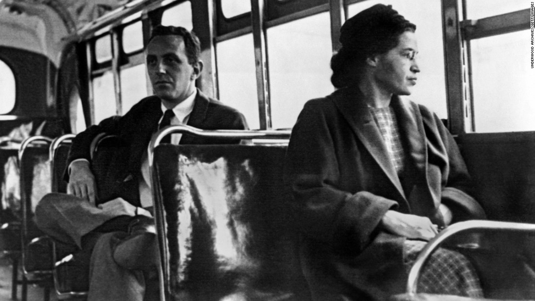 Rosa Parks &lt;a href=&quot;http://www.cnn.com/2010/US/12/01/rosa.parks.anniversary/index.html&quot;&gt;became one of the major symbols of the civil rights movement&lt;/a&gt; after she was arrested in Montgomery, Alabama, for refusing to give up her seat to a white passenger in 1955. For 381 days, African-Americans boycotted public transportation to protest Parks&#39; arrest and, in turn, segregation laws. The boycott led to a Supreme Court ruling desegregating public transportation in Montgomery. In this photo, Parks rides the bus a day after the Supreme Court ruling in 1956.