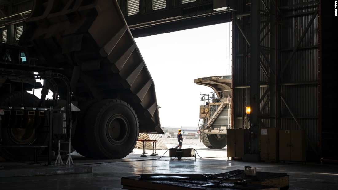 A worker inspects a 300-tonne truck at the Jwaneng diamond mine in Botswana, November 2015