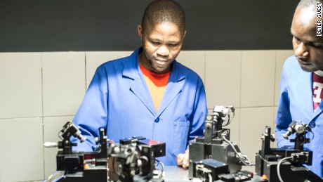 A KGK Diamonds employee polishes a diamond at the company&#39;s factory in Gaborone, Botswana. 