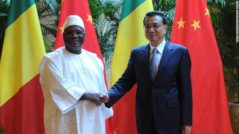 Malian President Ibrahim Boubacar Keita shakes hands with Chinese Premiere Li Keqiang during the World Economic Forum in Tianjin in 2014. More recently, China has pledged to assist security operations in Mali, following an Islamist attack on a hotel in the capital Bamako in November 2015. 