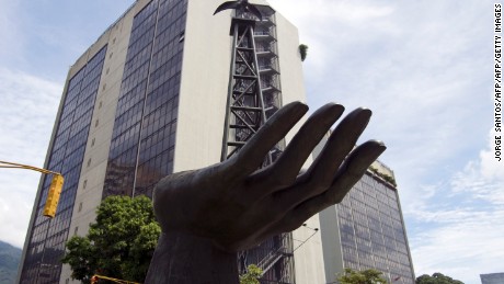 A statue depicting an oil drilling rig is seen in front of PDVSA (state owned oil company) in Caracas on November 03, 2009. Energy Minister Rafael Ramirez said Venezuela will propose to mantain actual production level at the OPEP meeting in Angola next December.  AFP   PHOTO/Jorge Santos (Photo credit should read JORGE SANTOS/AFP/Getty Images)