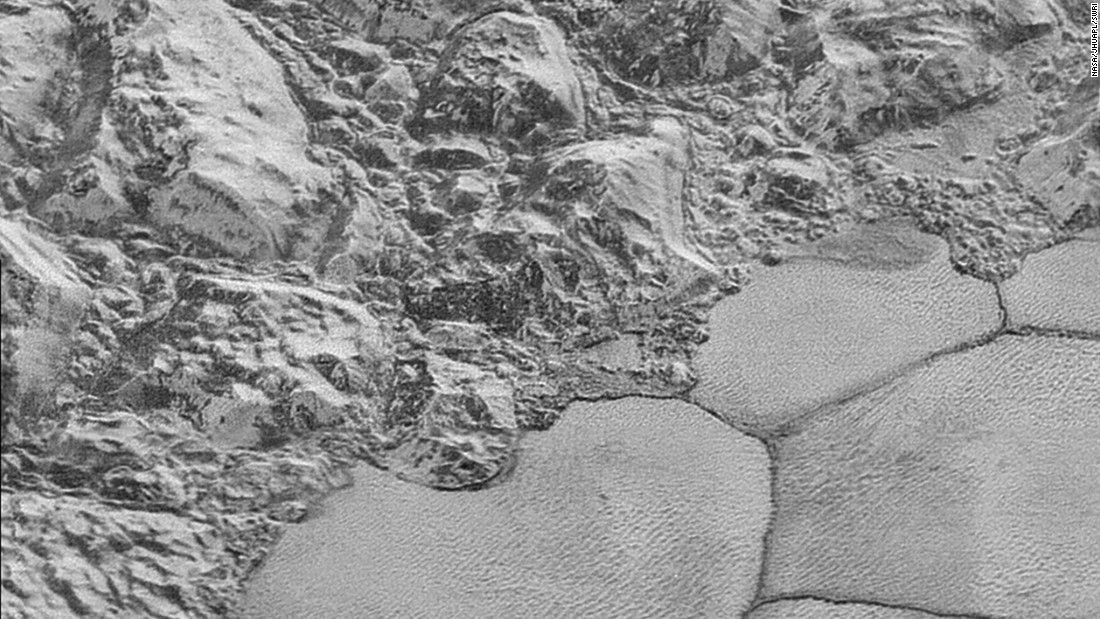 When NASA&#39;s New Horizons spacecraft flew past Pluto in July 2015, it captured this image of the major mountain ranges where it meets a vast icy plain called Sputnik Planitia. The ridges in these photos have now been identified as dunes made of solid methane ice grains. 