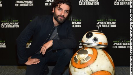 Star Wars actor Oscar Isaac poses alongside BB-8. 