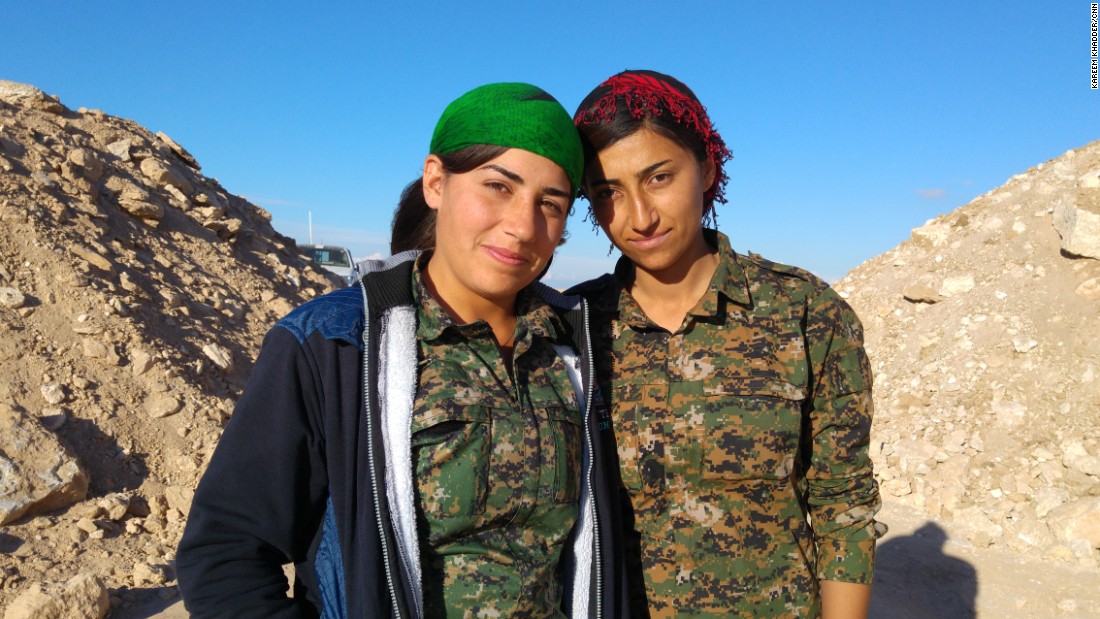 Two members of the YPK, the Kurdish &quot;Women&#39;s Defence Units,&quot; on the front lines south of Al-Houl, in Al-Hassakeh province.