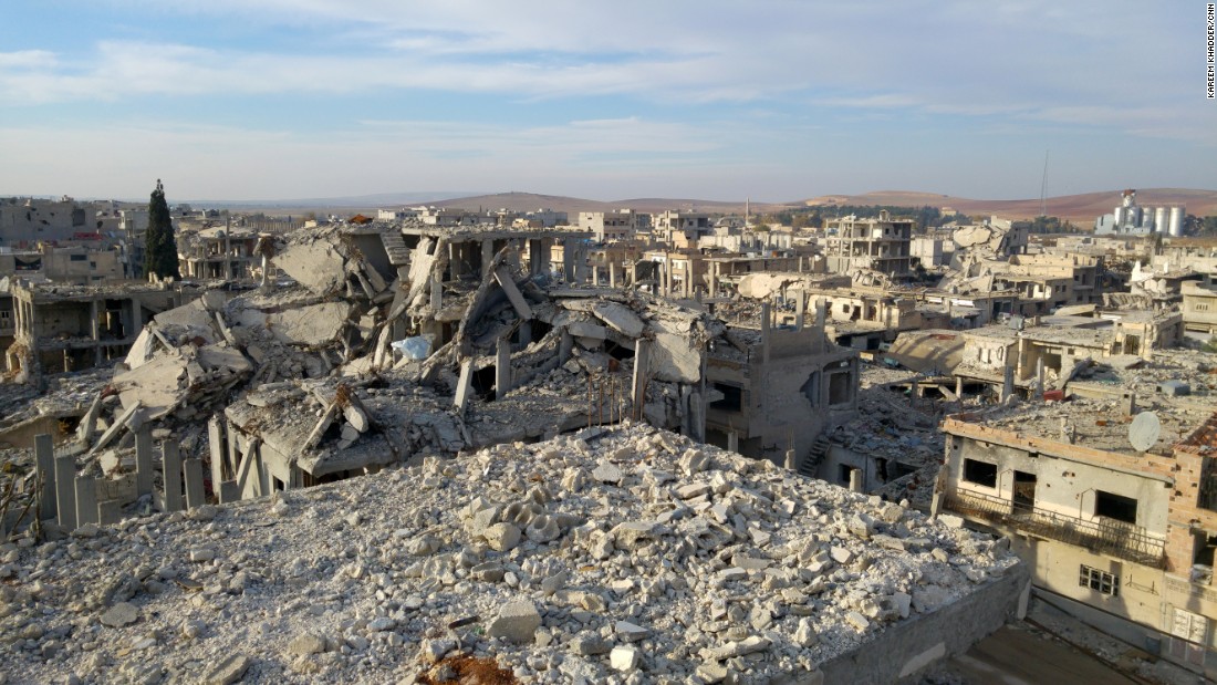 The view from Hammouda&#39;s pigeon perch. The reconstruction effort in Kobani has come to a screeching halt after Turkey closed its border, depriving the town of the building materials it desperately needs.