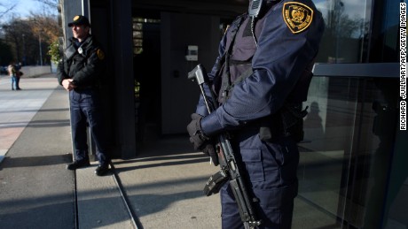 Security forces stand guard at the entrance of the United Nations headquarter in Geneva on December 10, 2015 after Swiss police declared actively searching the city for suspects who may be linked to last month&#39;s attacks in Paris. / AFP / Richard Juilliart        (Photo credit should read RICHARD JUILLIART/AFP/Getty Images)