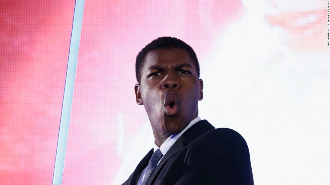 John Boyega poses with a lightsaber at the &#39;Star Wars: The Force Awakens&#39; fan event at the Roppongi Hills on December 10, 2015 in Tokyo, Japan. 