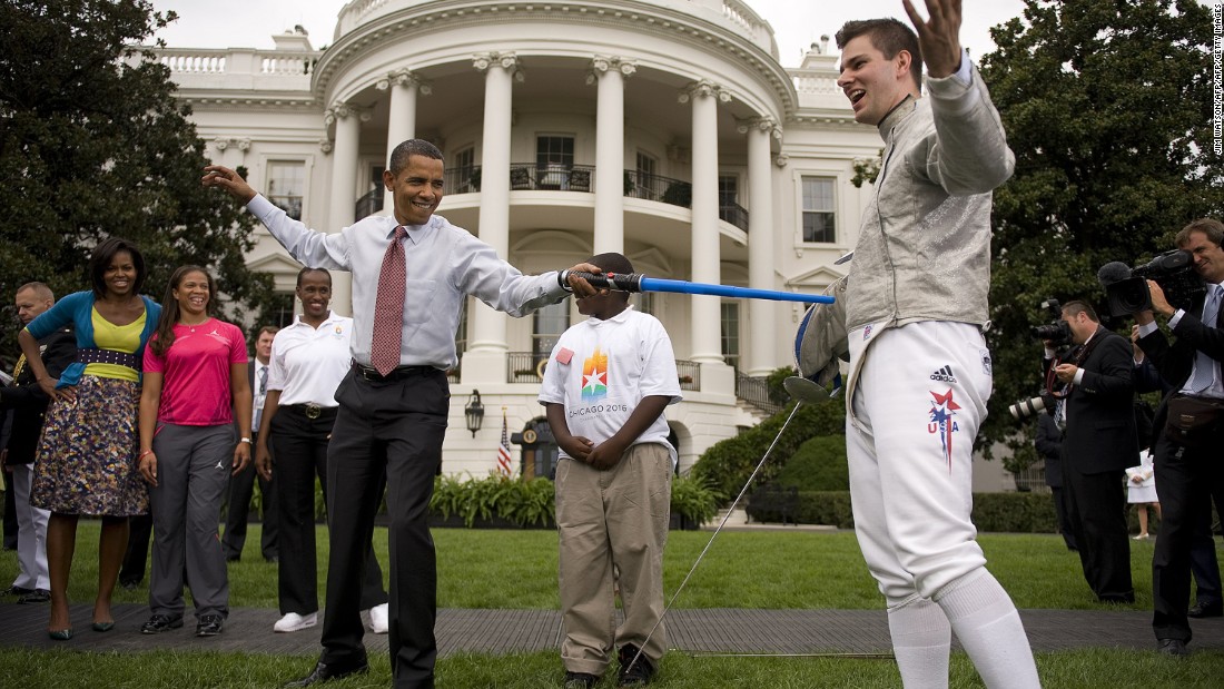 U.S. President Barack Obama fences with Olympic Fencer Tim Morehouse with a lightsaber.