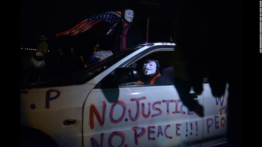 Protests and clashes with police after the officer wasn&#39;t indicted in the death of Michael Brown in Ferguson led to another round of protests, with the rallying cry &quot;No justice, no peace.&quot;