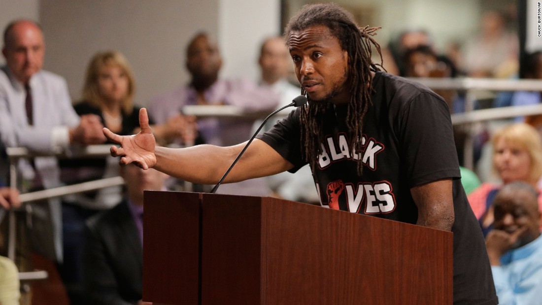 Activist Muhiyidin d&#39;Baha took the call for action into a North Charleston, South Carolina, City Council after the killing of Walter Scott by a North Charleston police officer.