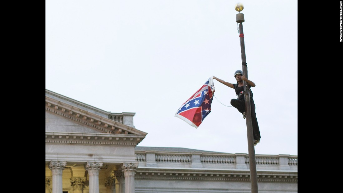 A battle waged against the Confederate flag as a symbol of hatred after Dylann Roof was accused of killing nine people in a South Carolina church in an attempt to spark a race war. Activist Brittany &quot;Bree&quot; Newsome took the battle flag off the flagpole at the Statehouse in Columbia, South Carolina.