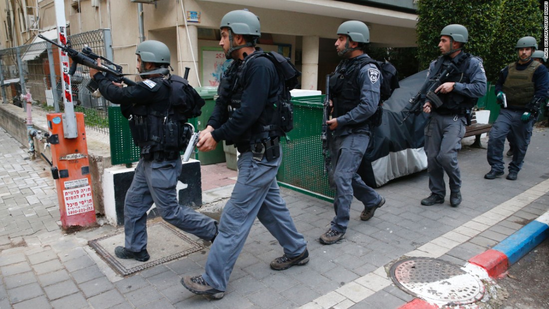 Security forces patrol the area after the shooting.