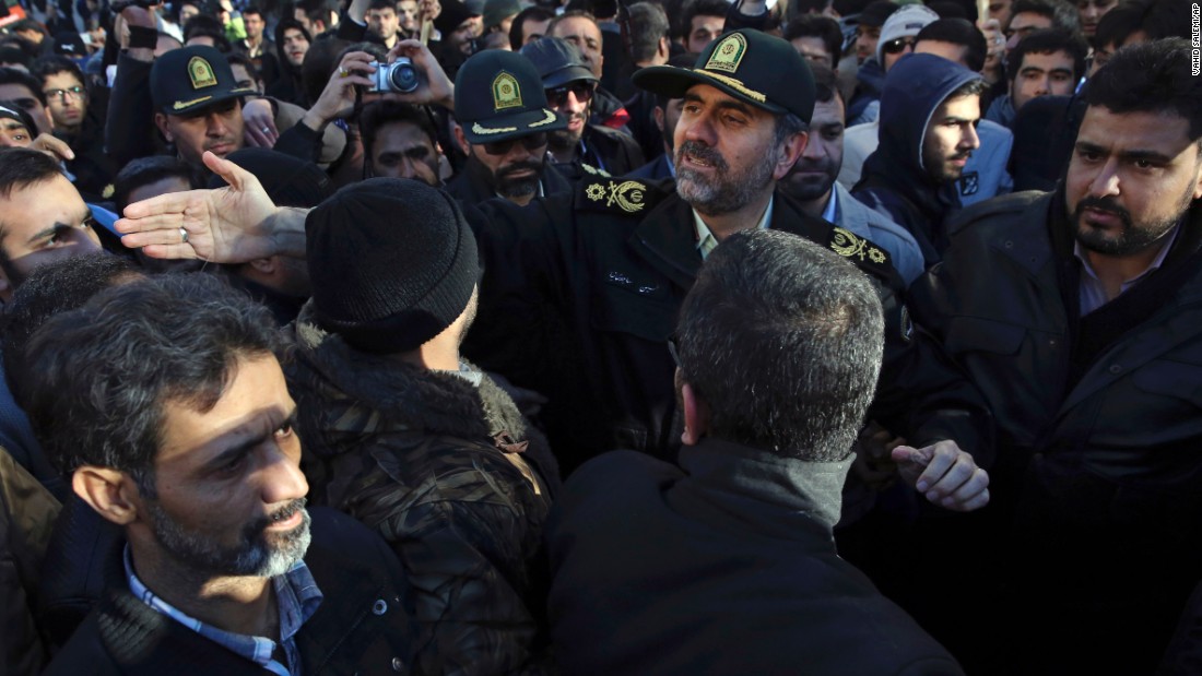 Tehran&#39;s police chief Gen. Hossein Sajedinia, center right, tries to disperse protesters in front of Saudi Arabia&#39;s Embassy in Tehran on January 3. 