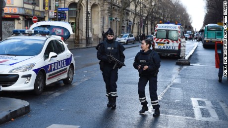 Armed French police women are seen at Barbes-Rochechouart in the north of Paris on January 7, 2016, after police shot a man dead as he was trying to enter a police station. A witness told AFP he had heard &quot;two or three shots&quot; in the incident that occurred a year to the day of the jihadist attack on satirical newspaper Charlie Hebdo.  AFP PHOTO / LIONEL BONAVENTURE / AFP / LIONEL BONAVENTURE        (Photo credit should read LIONEL BONAVENTURE/AFP/Getty Images)