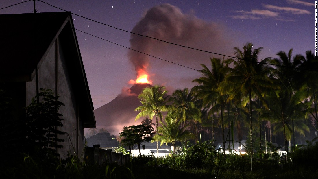 The Soputan volcano spews lava and ash during an eruption on Indonesia&#39;s Sulawesi island in January 2016.