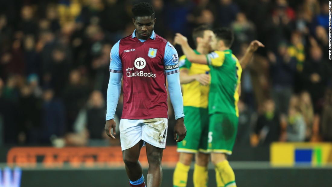 Aston Villa captain Micah Richards dejectedly leaves the field after his side&#39;s 2-0 defeat to Norwich City at Carrow Road. The Villans have won just one English Premier League match this season.