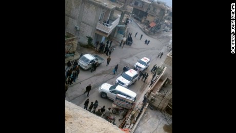 A photo taken by a local councilman shows cars belonging to aid agencies arriving in Madaya on Monday.