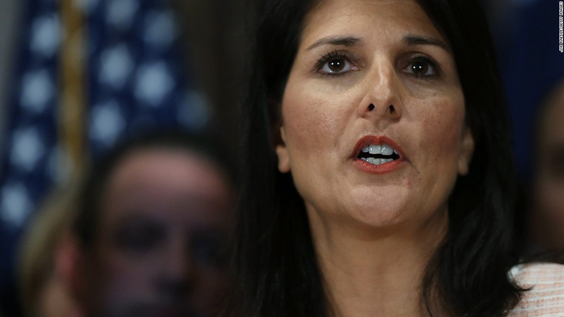 Haley speaks to the media as she asks that the Confederate battle flag be removed from the Capitol grounds on June 22, 2015, in Columbia.