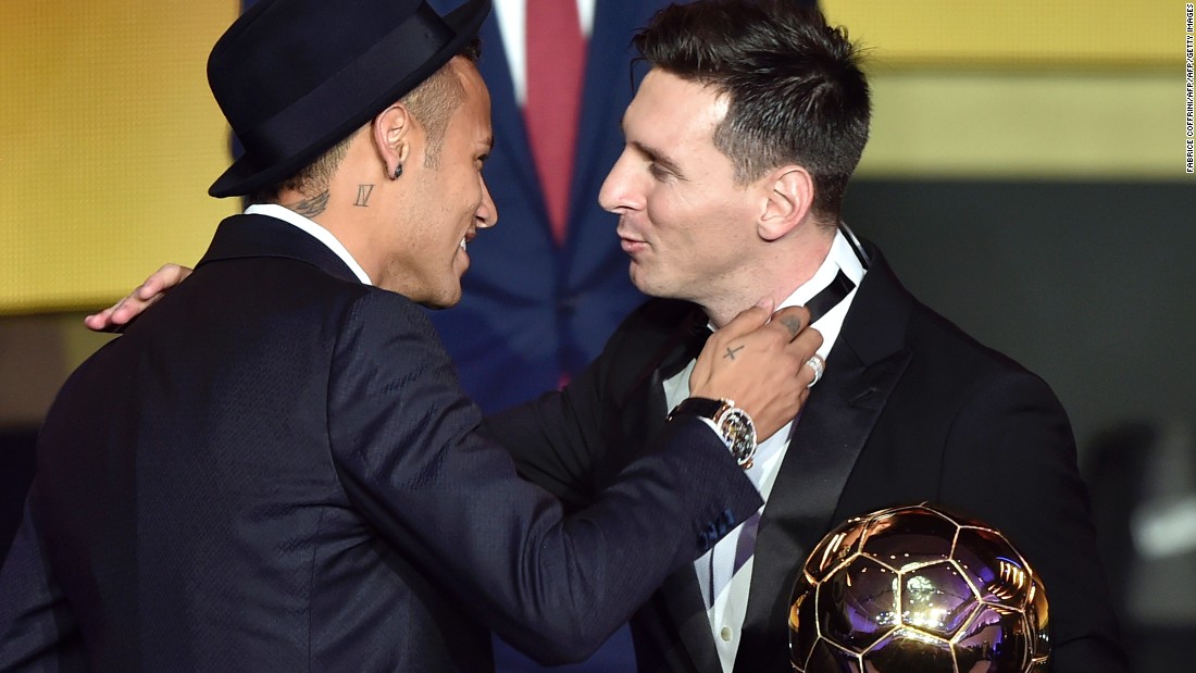 Messi is congratulated by Barcelona teammate and fellow nominee Neymar after winning the men&#39;s award for the fifth time. 