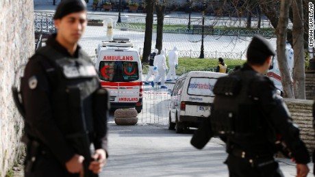 Policemen investigate for evidence at the Sultanahmet district after an explosion in Istanbul, Tuesday, Jan. 12, 2016. The explosion in a historic district of Istanbul popular with tourists killed 10 people and injured 15 others Tuesday morning, the Istanbul governor&#39;s office said. (AP Photo/Emrah Gurel)