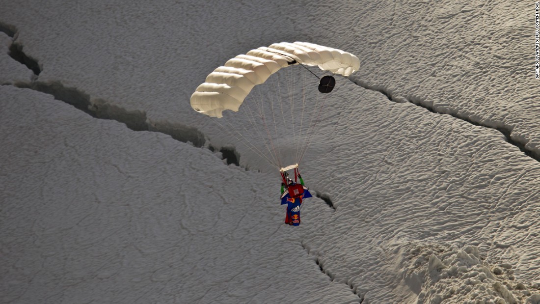 Valery Rozov prepares for landing after a wingsuit jump from the Grand Pilier d&#39;Angle, a nearly 14,000-foot-tall buttress on the southern side of Mont Blanc in July 2011.