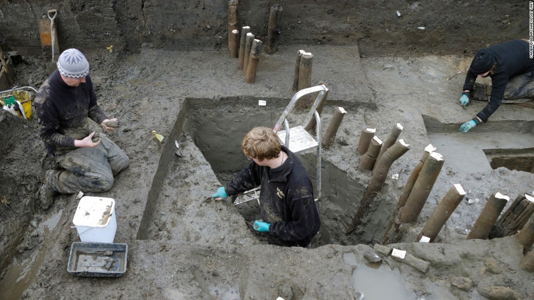 A recent excavation in eastern England has unearthed what is believed to be the best-preserved Bronze Age village found in Britain. Pictured is the excavation of the structure&#39;s palisade -- posts encircling the dwelling site -- during the exploratory investigation in 2006.
