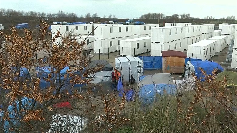 France opens new Calais &#39;Jungle&#39; camp for refugees