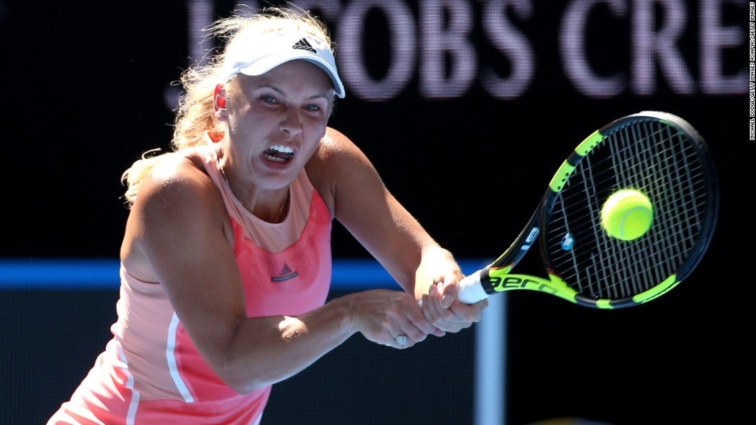 Former world No. 1 Caroline Wozniacki crashed out of the tennis season&#39;s opening grand slam after a shock defeat by Kazakhstan&#39;s Yulia Putintseva, ranked 58 places below the Dane. 