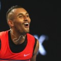 Nick Kyrgios smiles