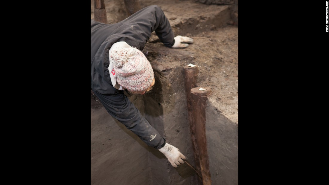 Marks left in wood show that the villagers used axes.