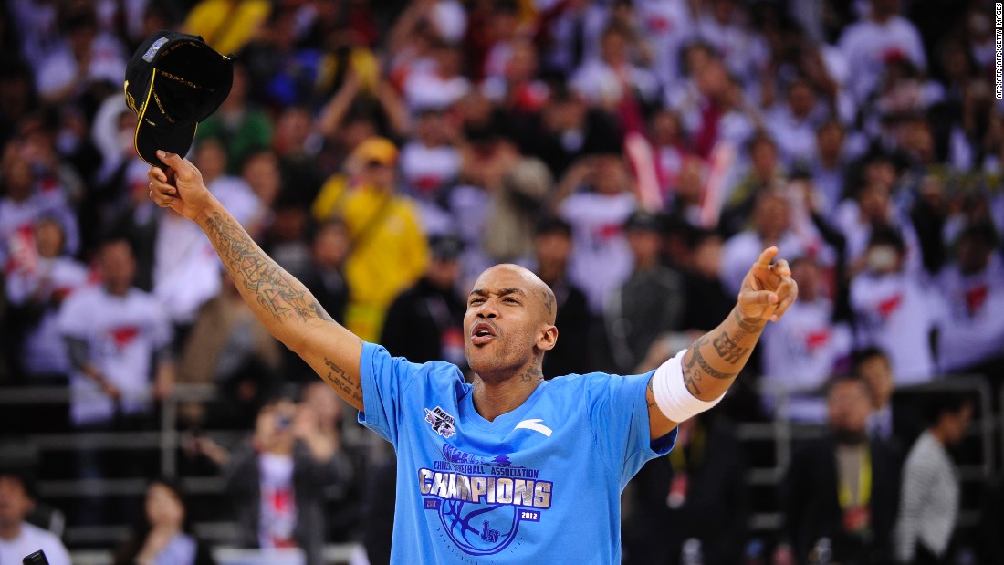 Former NBA All-Star Stephon Marbury has found a welcoming home in China, where he has remained since 2010. He is pictured celebrating after his team, the Beijing Ducks, won their first-ever Chinese championship behind his 41 points in March, 2012. 