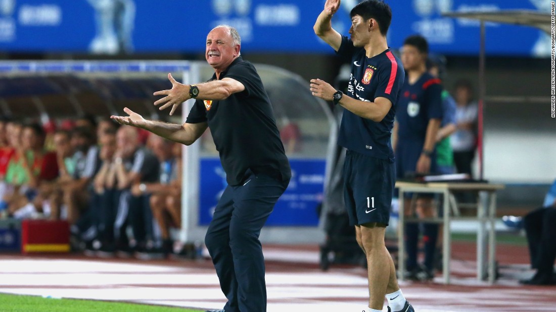 Former Brazil and Chelsea manager Luiz Felipe Scolari -- now head coach of Asian Champions League winners FC Guangzhou Evergrande -- reacts during the international friendly match against Bayern Munich on July 23, 2015.
