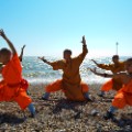 shaolin monks beach england 