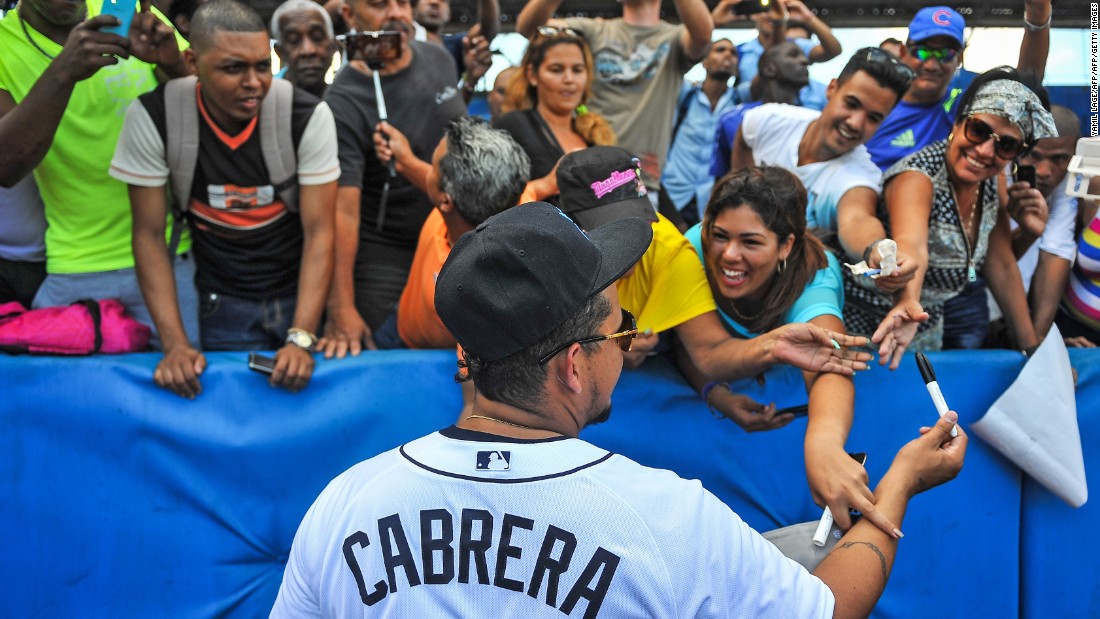 The group met fans at the Latin American Stadium in Havana. Here, Venezuela&#39;s Miguel Cabrera signs autographs.