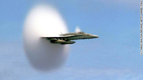  An F/A-18 Hornet breaks the sound barrier.