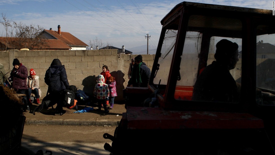 Miratovac&#39;s routine was disrupted months ago when refugees began using this route. Today, it is an ordinary sight to see a tractor pass by refugees waiting to board buses.