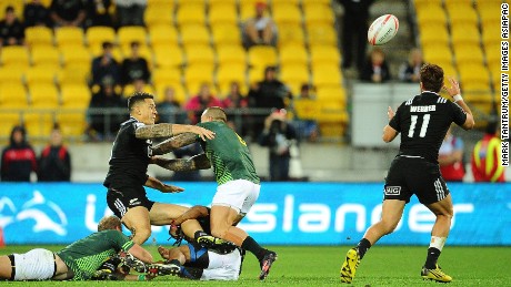 Sonny Bill Williams of New Zealand makes his vital pass to teammate Joe Webber for the winning try in the pool game decider against South Africa.