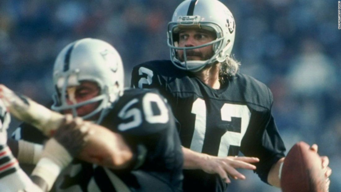 Oakland Raiders Hall of Famers surround bust of late QB Ken