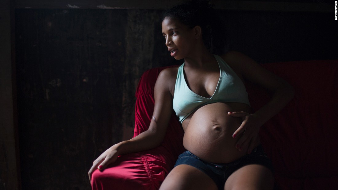 Tainara Lourenco sits inside her home in Recife, Brazil, on Friday, January 29.  Lourenco, five months pregnant, lives at the epicenter of Brazil&#39;s Zika outbreak. The Zika virus has been linked to microcephaly, a neurological disorder that results in newborns with small heads and abnormal brain development.