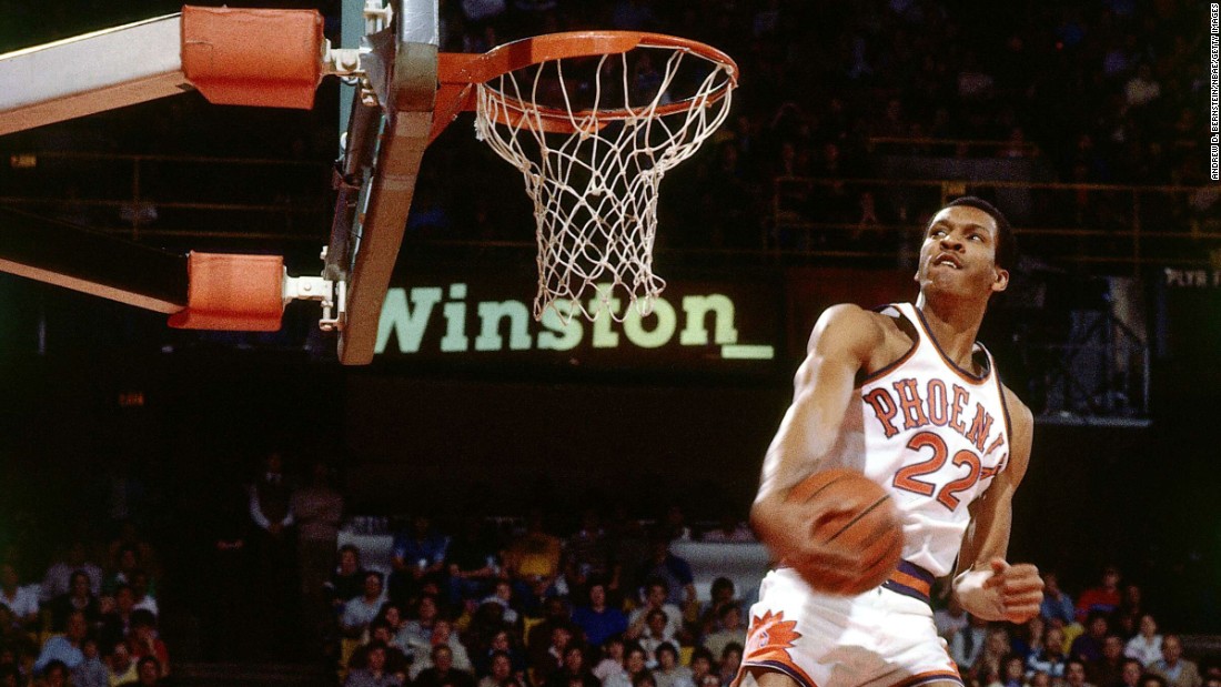 Larry Nance glides to the rim during the NBA&#39;s first Slam Dunk Contest, which was held in Denver on January 28, 1984. Nance defeated &quot;Dr. J&quot; Julius Erving in the finals of a nine-man competition that also included future Hall of Famers Dominique Wilkins and Clyde Drexler. Over the past three decades, the NBA&#39;s Slam Dunk Contest has provided some of the most iconic moments in league history, dazzling viewers with its unique blend of athleticism and showmanship. It is traditionally held midseason as part of the league&#39;s All-Star Game festivities.