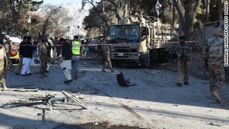 Soldiers examine a bomb explosion site in Quetta, Pakistan.