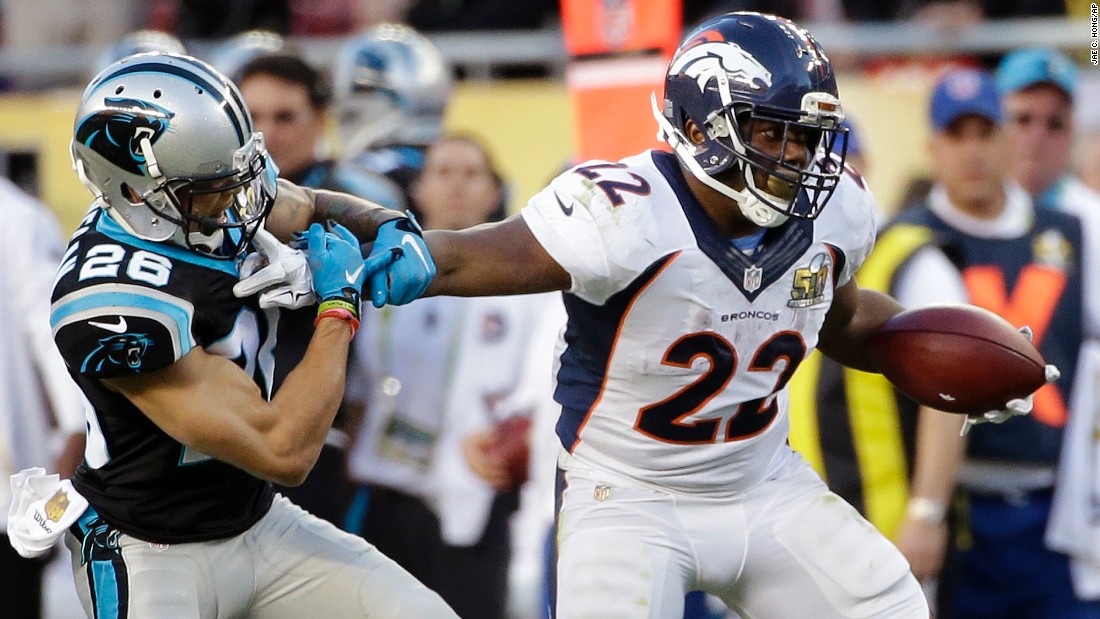 Anderson pushes off Cortland Finnegan as he runs the ball during the first half.