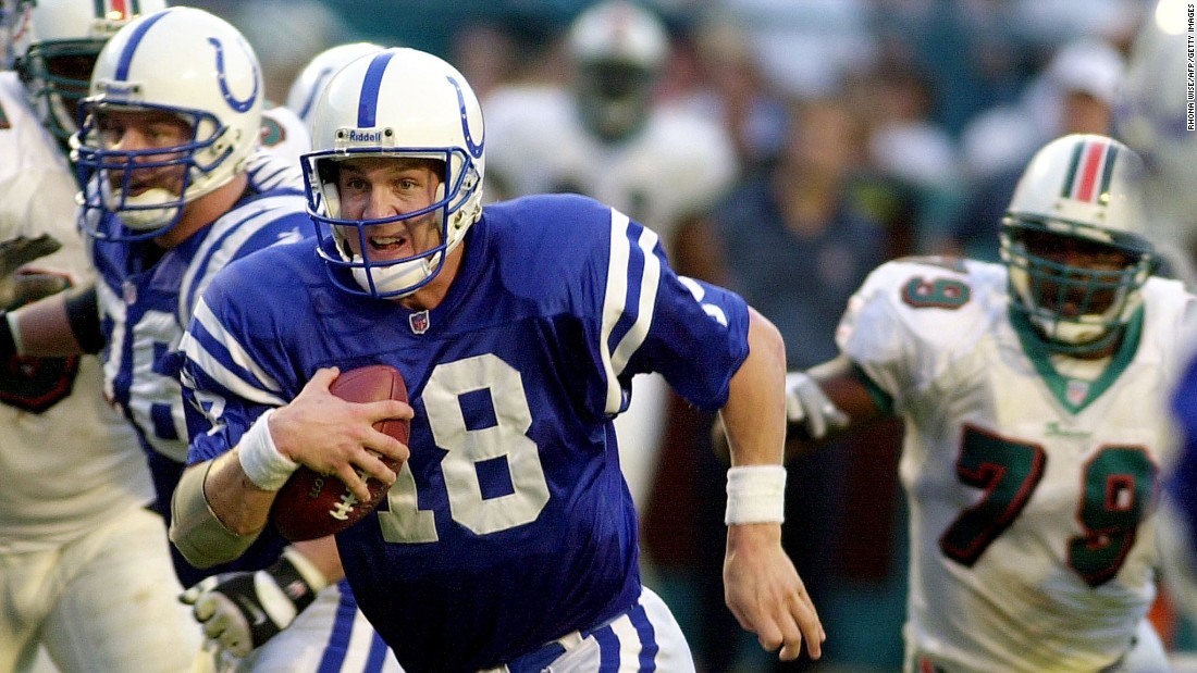 Manning scrambles into the end zone for a touchdown in 2000.