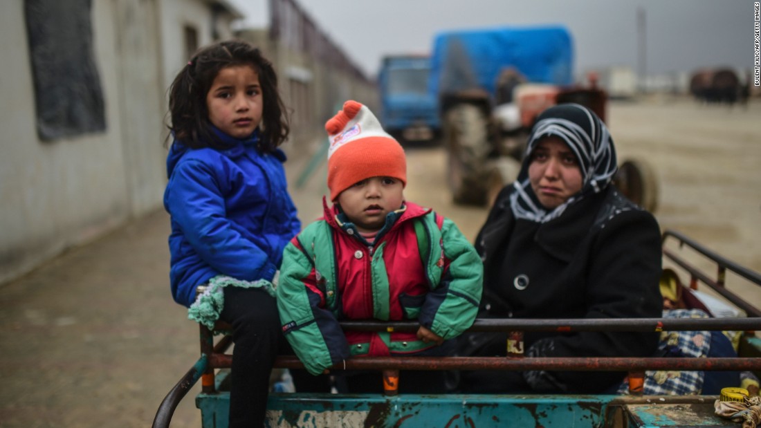 Refugee children arrive at the Turkish border gate on February 6.