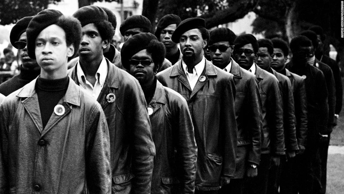 Panthers line up at a rally in DeFremery Park, in Oakland, California. The Panthers&#39; focus on police brutality in the black community and racial bias in the criminal justice system anticipated the Black Lives Matter movement 50 years later. 
