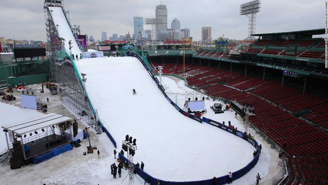 A snowboarder makes a practice run down the ski and snowboarding ramp at Fenway Park, Boston, ahead of the Big Air at Fenway event.