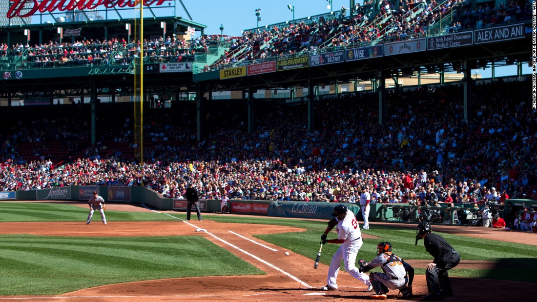 A more traditional view of Fenway Park as slugger David Ortiz swings from the plate against the Baltimore Orioles.