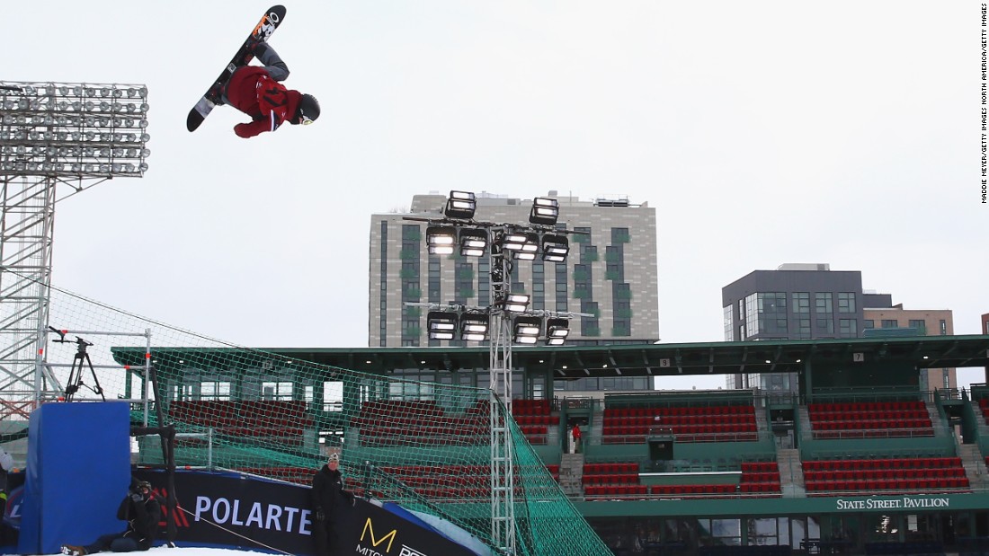 Snowboarder Angus Waddington of Australia competes in the second heat during day one of Big Air at Fenway.
