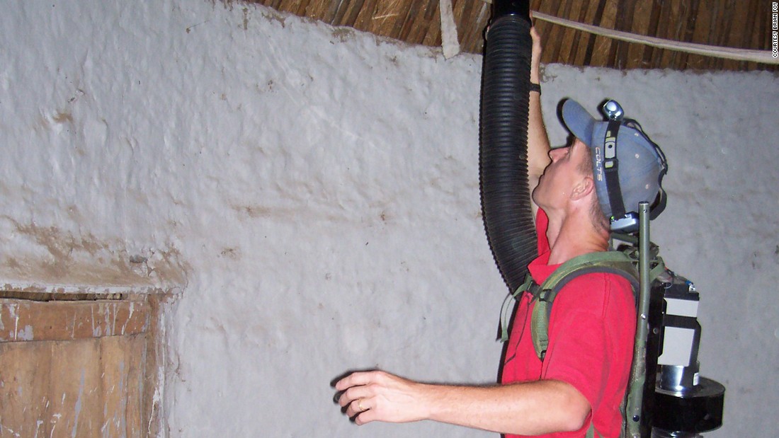 Brian Foy aspirates malaria-causing mosquitoes inside a villager&#39;s home in Ibel, Senegal. Only female Anopheles mosquitoes transmit malaria; they pick up a parasite called a plasmodium from infected people when they bite to obtain blood needed to nurture their eggs.