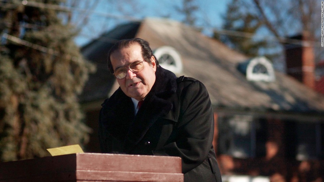 Scalia speaks to a crowd gathered at the Religious Freedom Monument in Fredericksburg, Virginia, to celebrate Religious Freedom Day on January 12, 2003. Scalia complained that courts have gone overboard in keeping God out of government. 